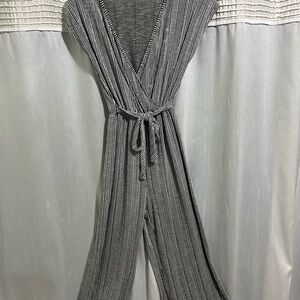 Caution To The Wind Black and White Jumpsuit with Wrap V-Neck and Tie Belt